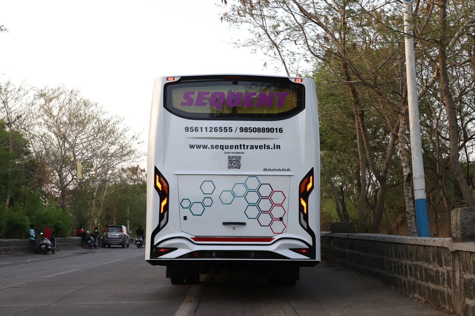 Rear exterior view of Sequent Travels bus