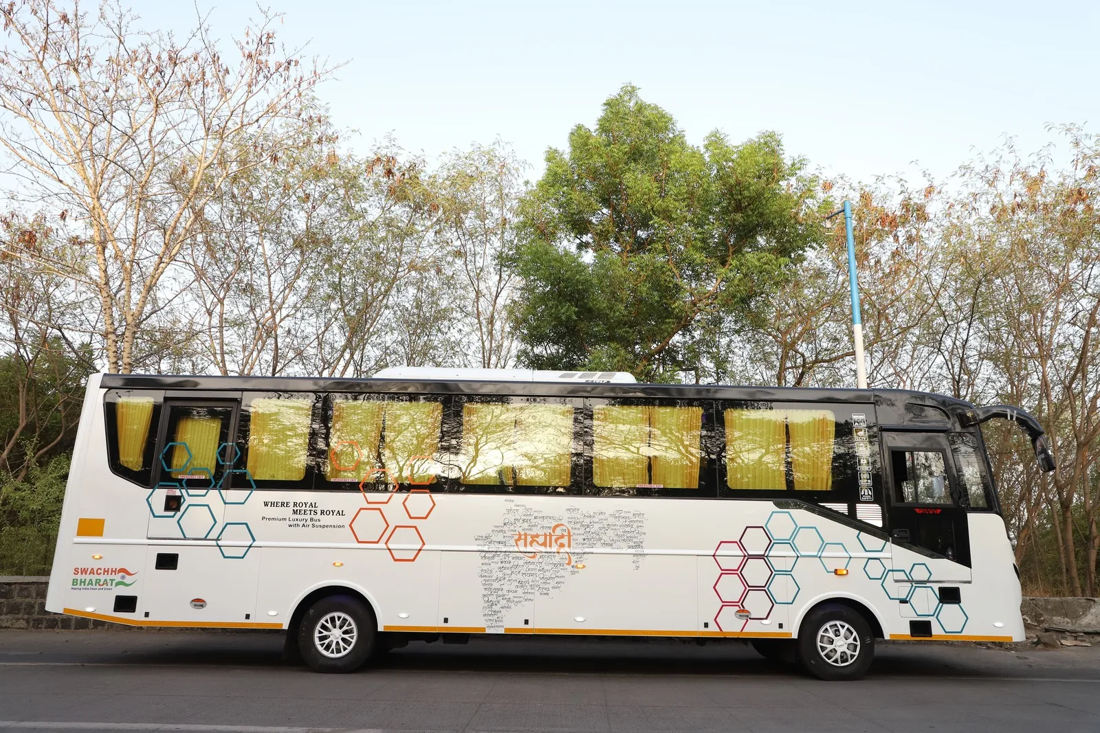 Full side profile exterior view of Sequent Travels bus